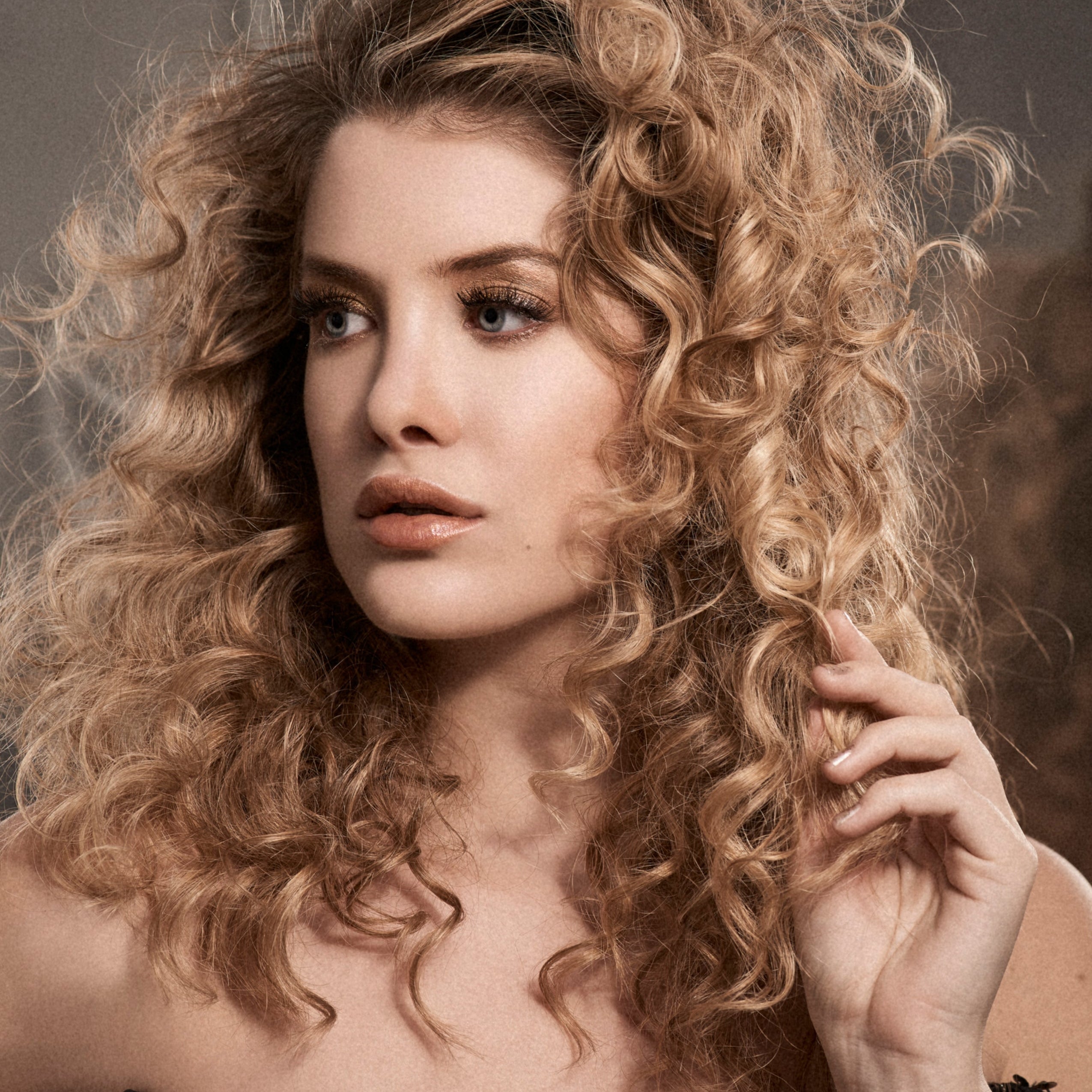 Unlock Perfect Curl Formation: The Benefits of a Modern Perm for the Perfect Curly Hair